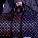 A model presents a bag creation by designer Virgil Abloh as part of his Fall/Winter 2019-2020 collection show for fashion house Louis Vuitton during Men's Fashion Week in Paris, France, January 17, 2019. REUTERS/Gonzalo Fuentes - RC1DEB618080